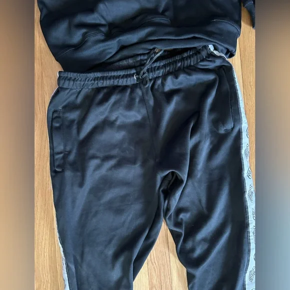 New in the bag black sweatshirt and sweatpants sealed in package.  Sz S, Med, XL - Picture 5 of 13
